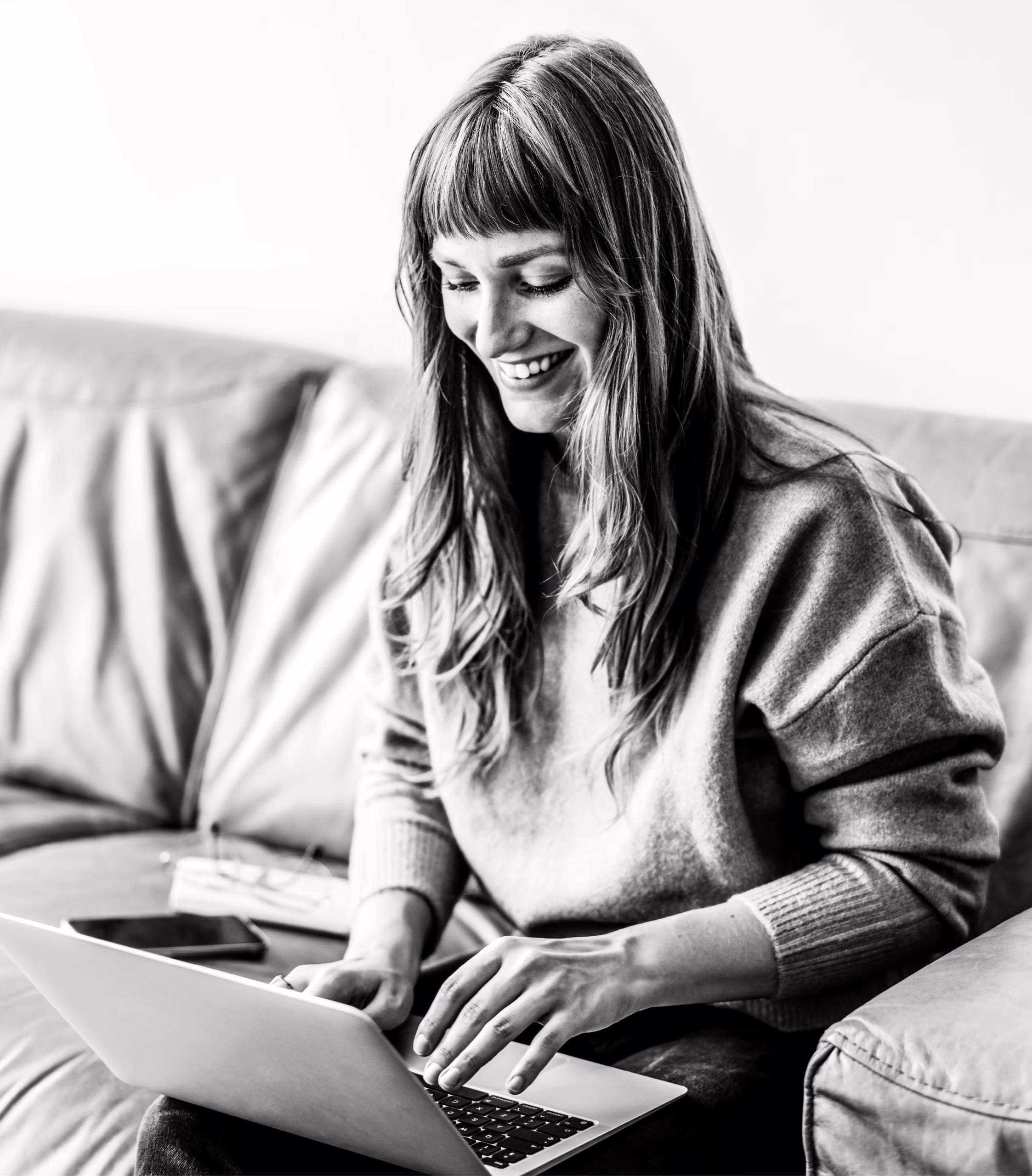 Woman On Her Laptop and Smiling - Blog Image