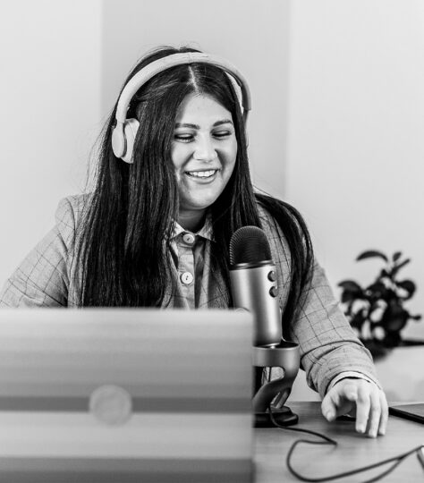Woman conducting podcast interview